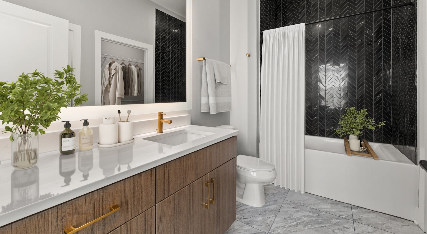 a bathroom with a sink, toilet and shower