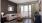 living room with large glass door and couch