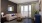 living room with a couch and large glass door